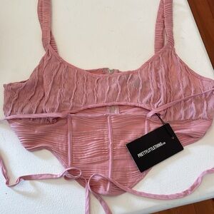New Pretty little things pink corset top with tags. Sz 16, fits about 12/14.